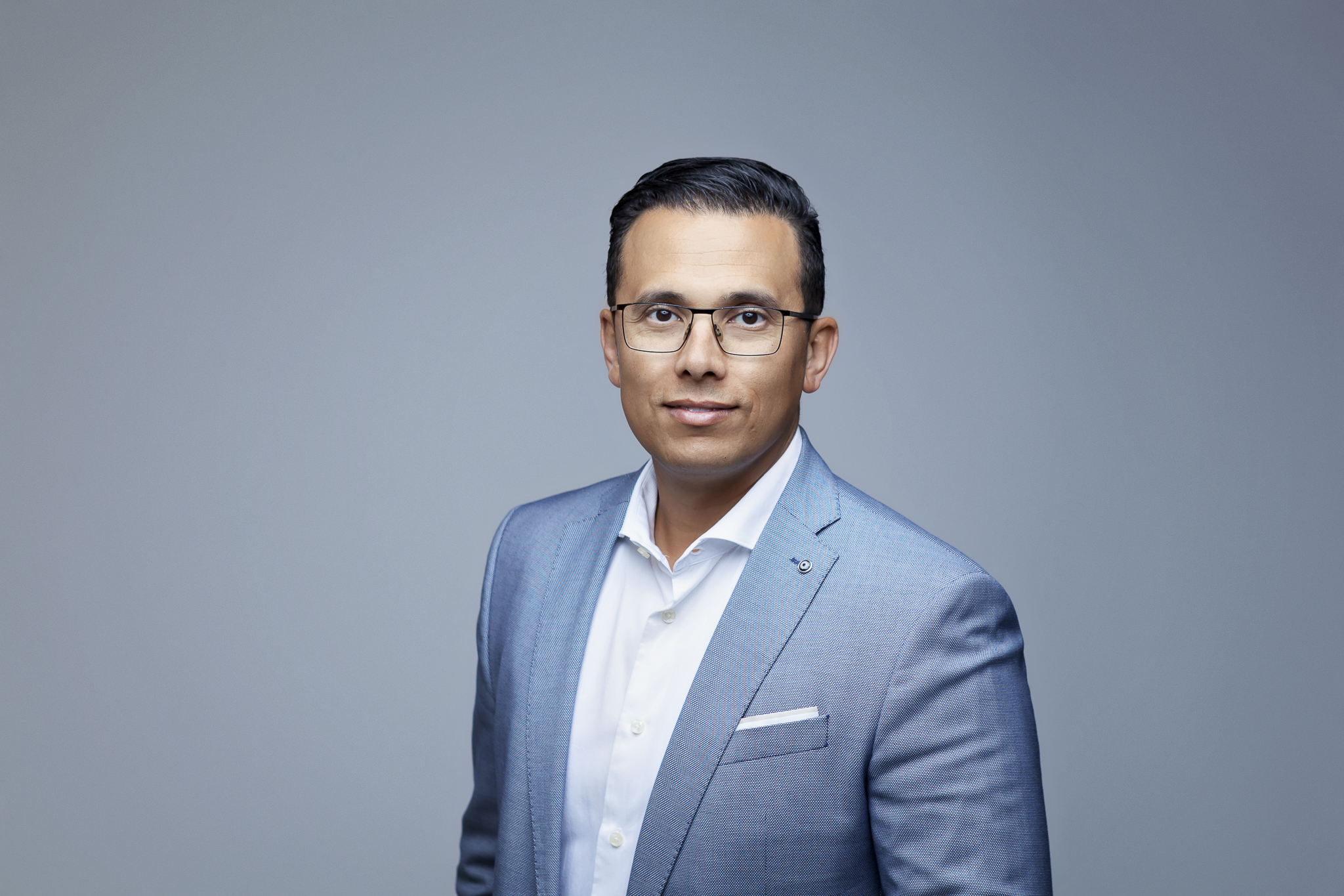 Headshot of a male in photography studio.