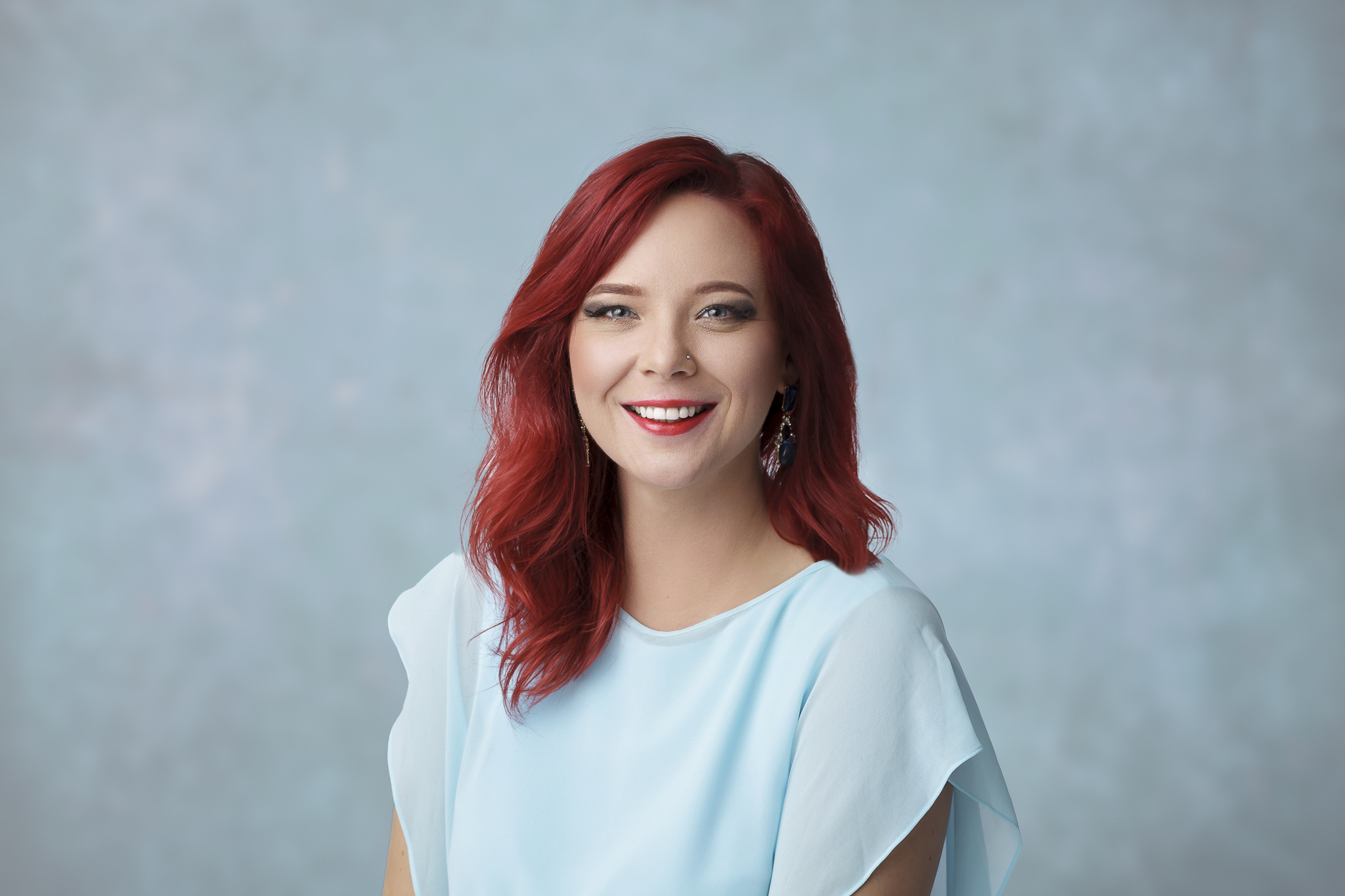 Business headshot of woman smiling for the camera. Doha, Qatar